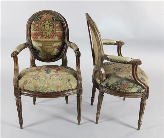 A set of six Louis XVI style stained beech fauteuils,